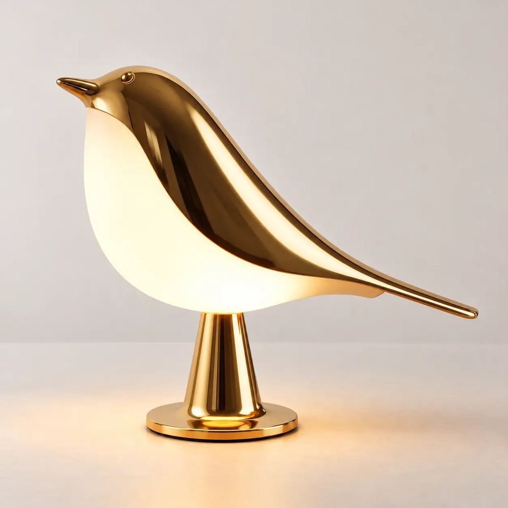 Svala fuglelampe i guld